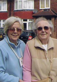 A Care volunteer with a client.